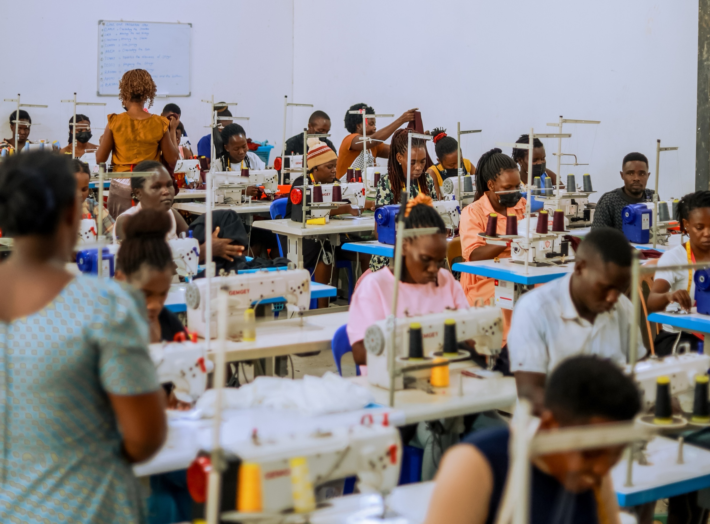 Seamstresses at work in the Waya Collective factory